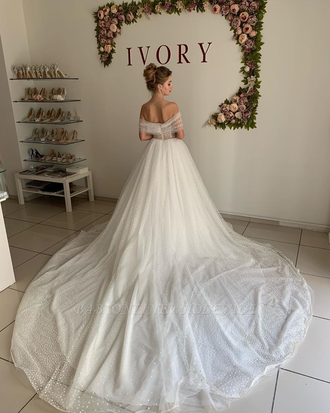 white gown with pearls