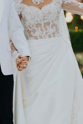 Robe de mariée trapèze en dentelle à col haut et manches longues_5